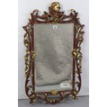 A 19th century continental-style rectangular wall mirror inset bevelled plate, & in gilt & gold