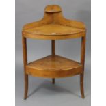 A pine corner washstand, on three slender shaped legs, 25” wide x 38” high.