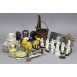 A group of nine Chinese porcelain blanc-de-chine-type small figures; a yellow glazed model of a cat