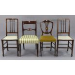 A regency-style inlaid-mahogany bow back dining chair with padded seat, & on sabre legs; together