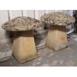 A pair of reconstituted-stone staddle stones (w.a.f), 19” diam. x 21” high.