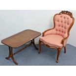 A Victorian-style buttoned-back occasional chair; & a mahogany rectangular low coffee table, 36”