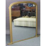 A late Victorian giltwood frame overmantel mirror with rounded top, (slight faults), 52” wide x