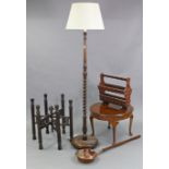 A 1930’s oak standard lamp with turned & spiral-twist centre column & on circular base, with