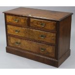 A late Victorian walnut low chest, fitted two short & two long graduated drawers with brass swan-