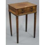 A late 19th/early 20th century mahogany work table with hinged lift-lid, fitted long drawer, & on