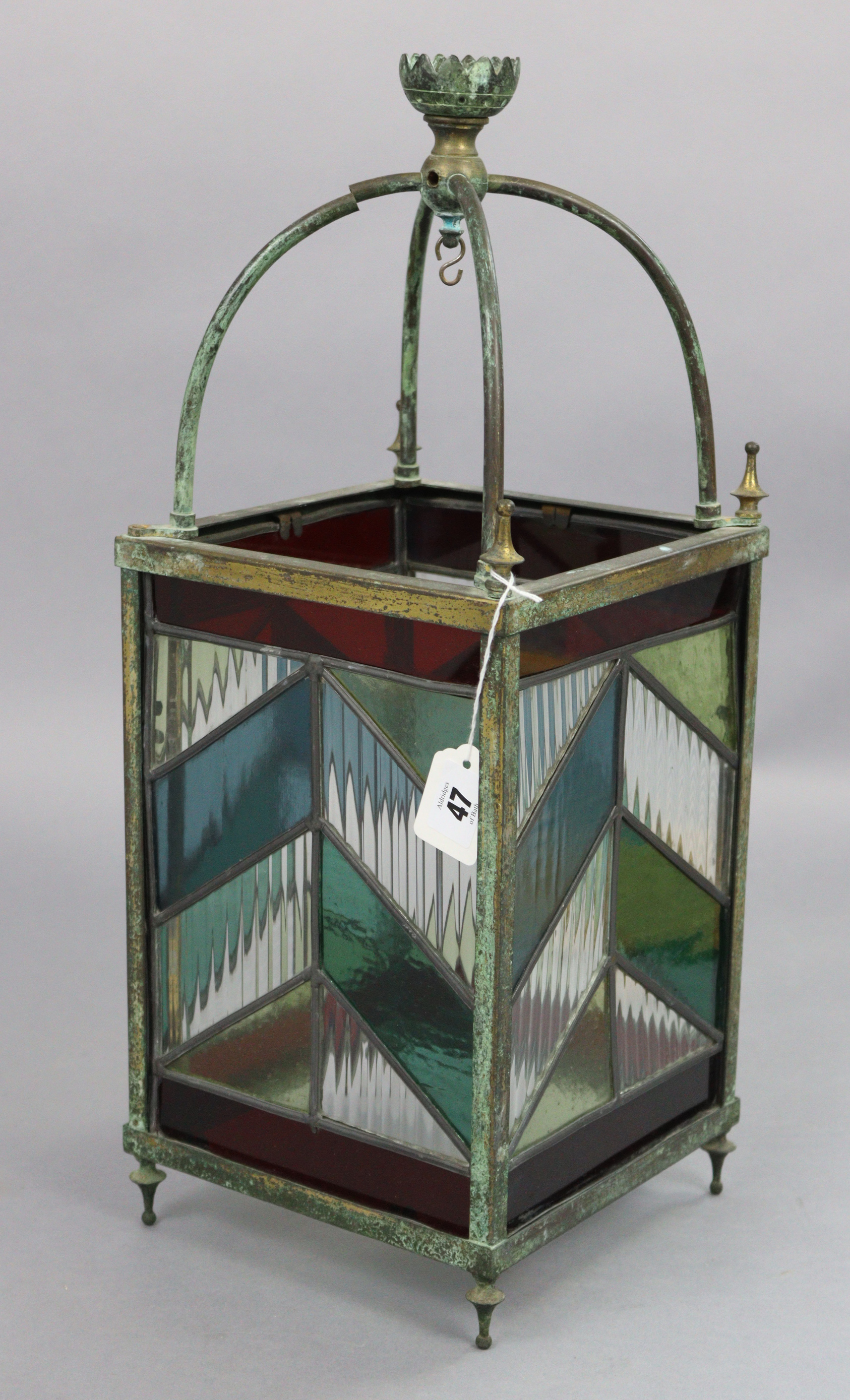 An Edwardian brass frame square hall lantern, inset leaded stained glass panels, 8” wide x 20¾”