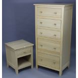 A modern light oak tall chest, fitted six long graduated drawers with turned knob handles, 24¾” wide