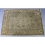 A Ralph Lauren cream-coloured Persian-style rug, design no. RLR1741-1111; 5ft 1” x 7ft 6”.