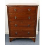 A mahogany small chest, fitted four long graduated drawers with iron ring handles, & on bracket