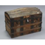 A ribbed domed-top travelling trunk (w.a.f.)., 30¾” wide; & a small walnut china display cabinet,