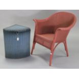 A Lloyd Loom pink painted basket chair; & two Lloyd Loom painted linen boxes.