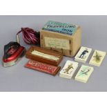 An F. H. Ayres of London “Spellican 5” game, cased; together with a Clem travelling iron (