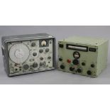 A Marconi standard signal generator (No. 52802/18), in grey metal case, & an Admy Patt radio