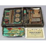 Various items of Meccano, - wheels, struts, cogs, etc., contained in a wooden box.