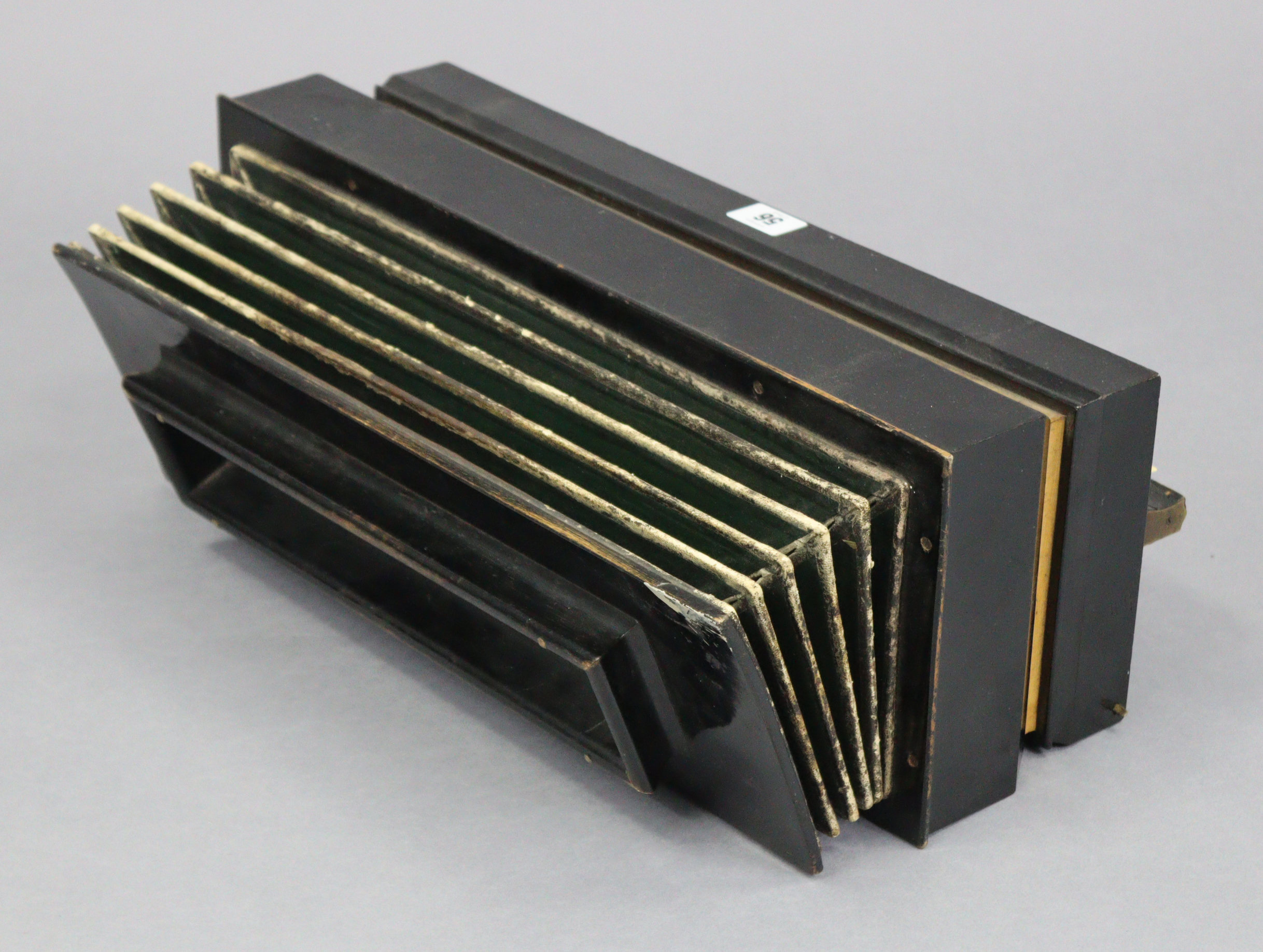 An early /mid-20th century Busson of Paris ebonised wooden accordion, 18¼” long. - Image 2 of 2