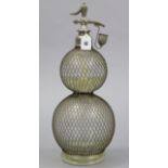 A large wire-covered clear glass gourd-shaped soda syphon bottle with chrome fittings, & stamped “B.