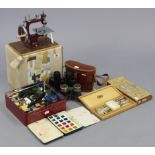 An Essex miniature sewing machine, boxed; together with two paint sets; ten various die-cast scale