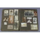 A family photograph album containing numerous photographs; together with various books.