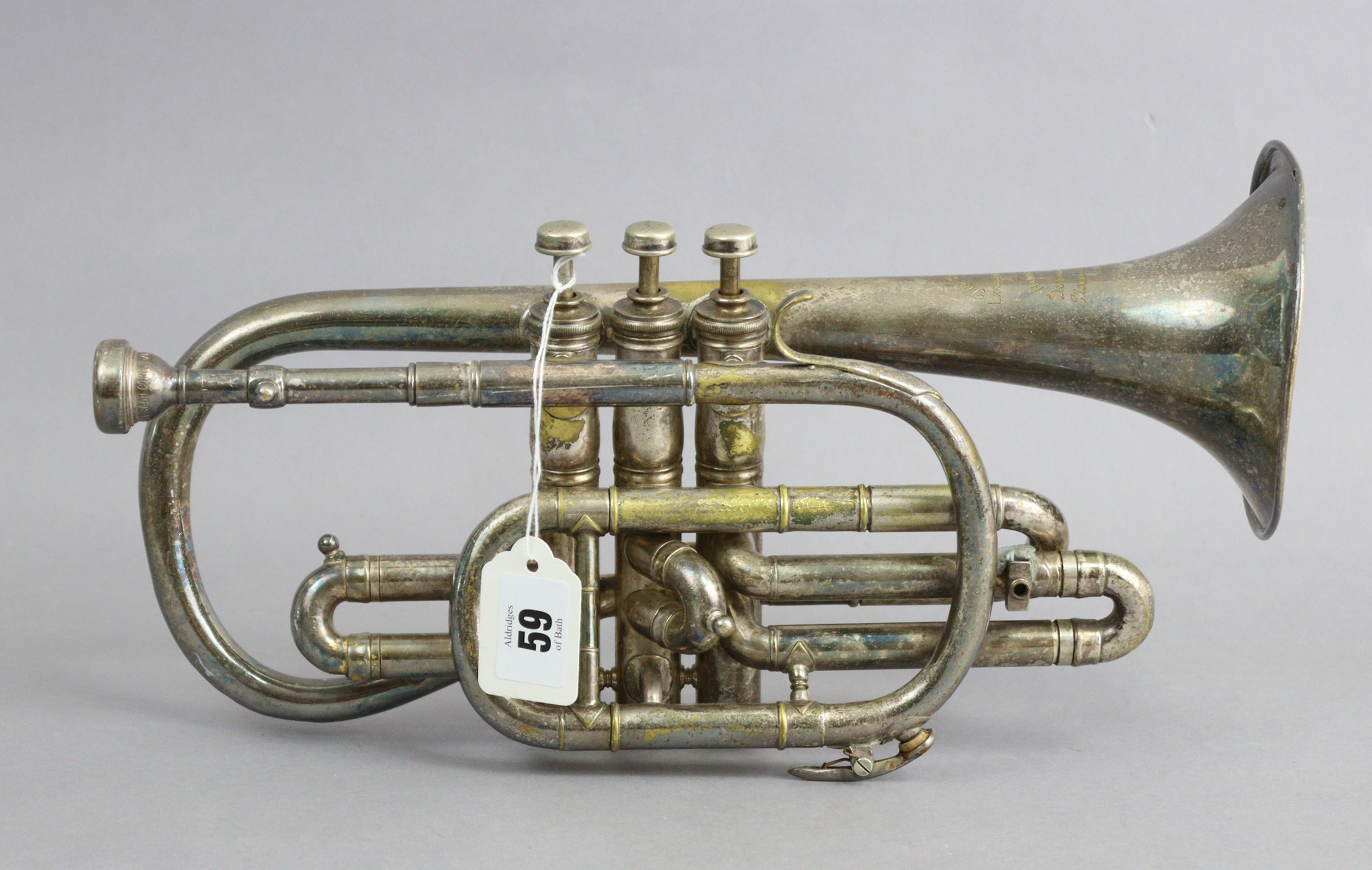 A Hawkes & Son of London chrome-plated clippertone class A cornet (No. 39244), 13½” long.