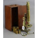 An early/mid-20th century brass monocular microscope by C. Collins of London, with five additional
