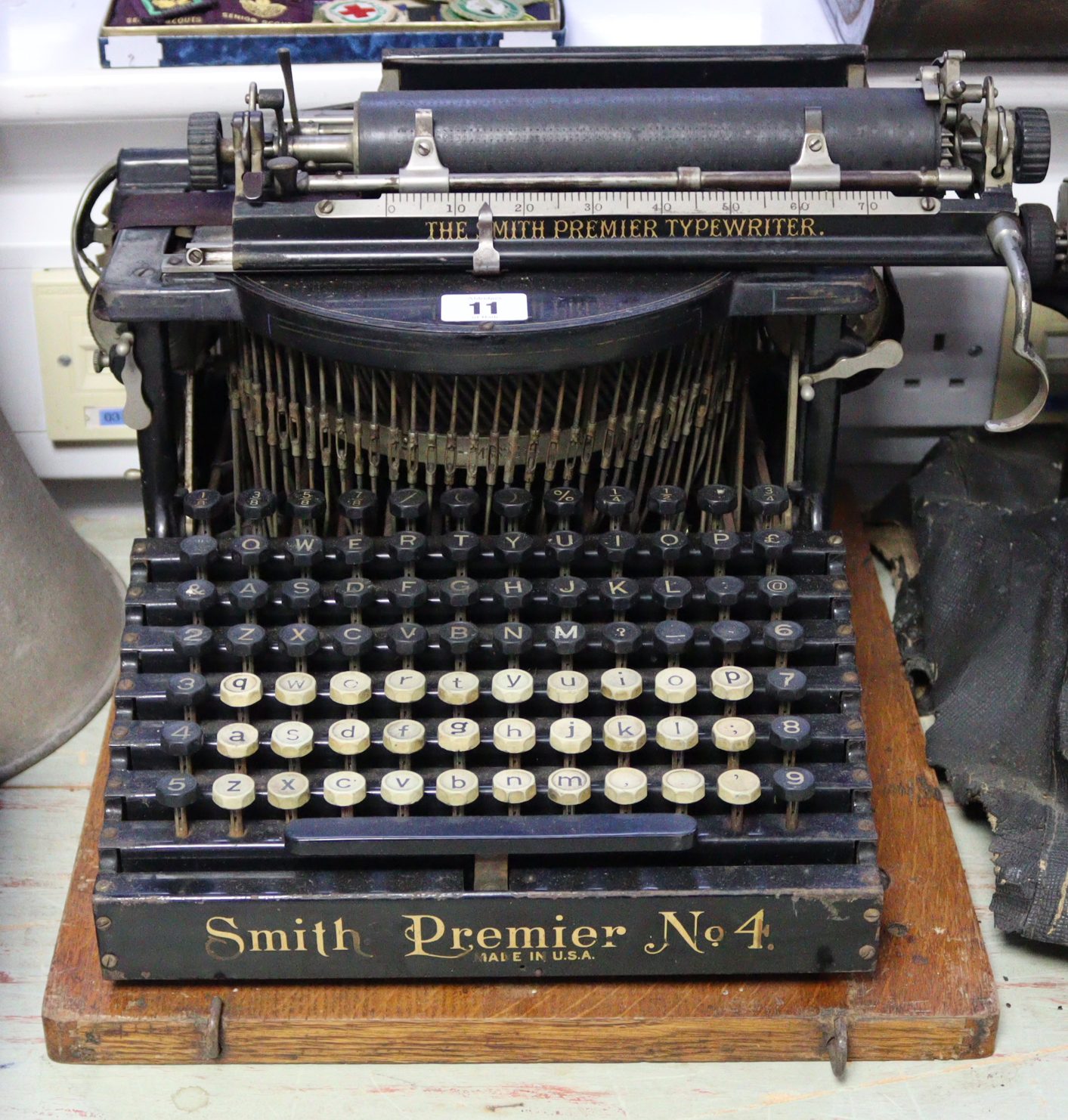 A vintage Smith Premier “No. 4” typewriter, with case.