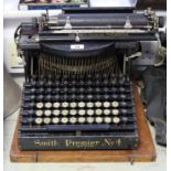 A vintage Smith Premier “No. 4” typewriter, with case.