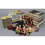 Forty-two “Blue Peter” books; two children’s annuals; twenty-five Ladybird books; & various dolls.