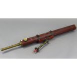 An early-mid 20th century brass telescope by Ross of London, with crimson leatherette covered tube,