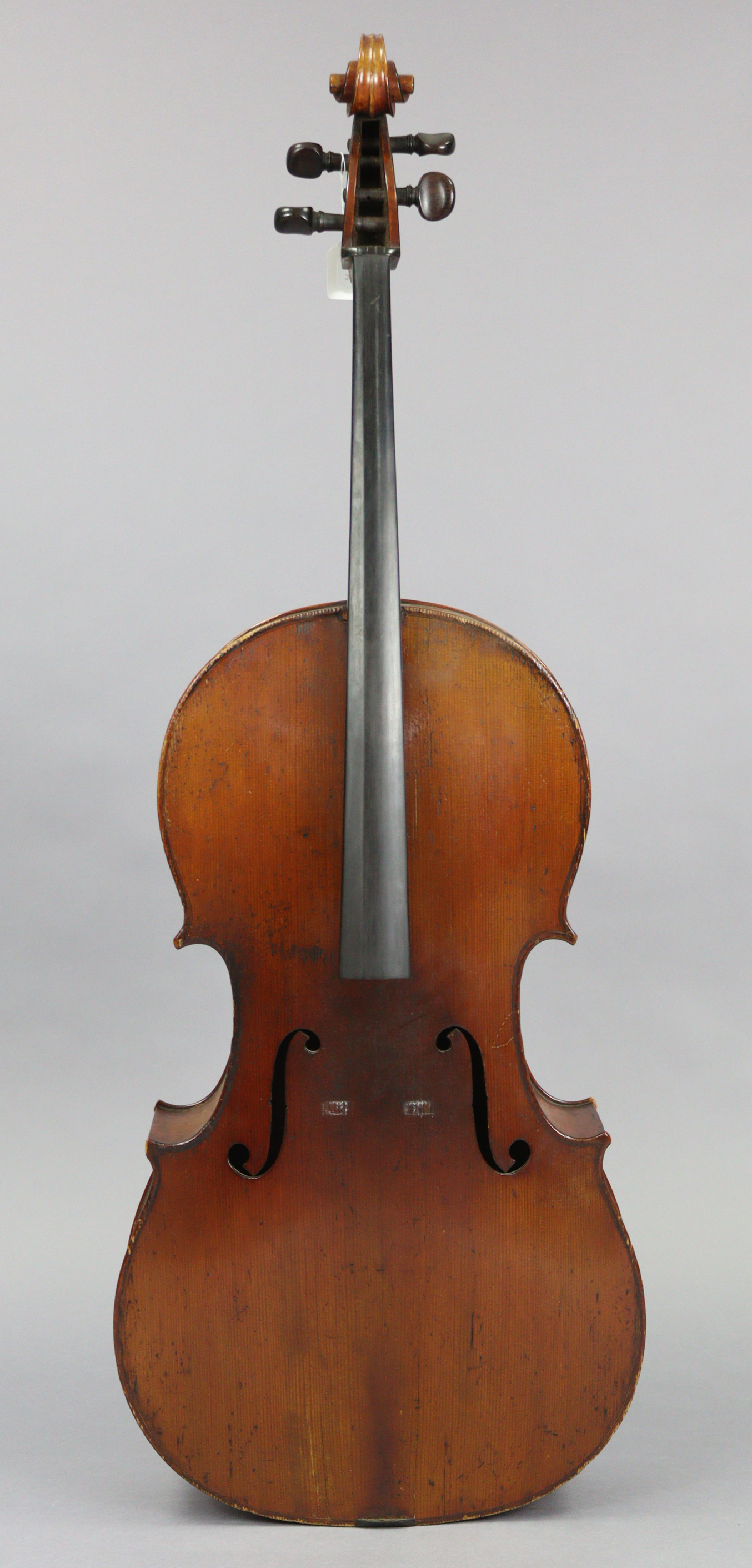 A mahogany cello (lacking strings), 49¾” tall, bears label “Made for Hart & Son, 28, Wardour St, Lo