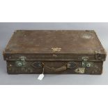 An early-mid 20th century fibre-covered & leather-bound suitcase, with chrome twin-lever locks, 26½”