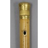 A late 18th/early 19th century gent’s wooden walking cane with engraved yellow-metal knob handle,
