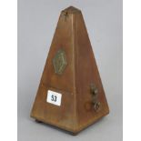 A Maezel (French) metronome in mahogany case, 9” high.