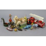 Twelve various vintage clockwork & battery-operated toys, etc.