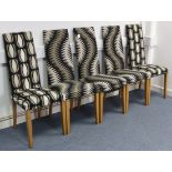 A matched set of ten modern dining chairs.