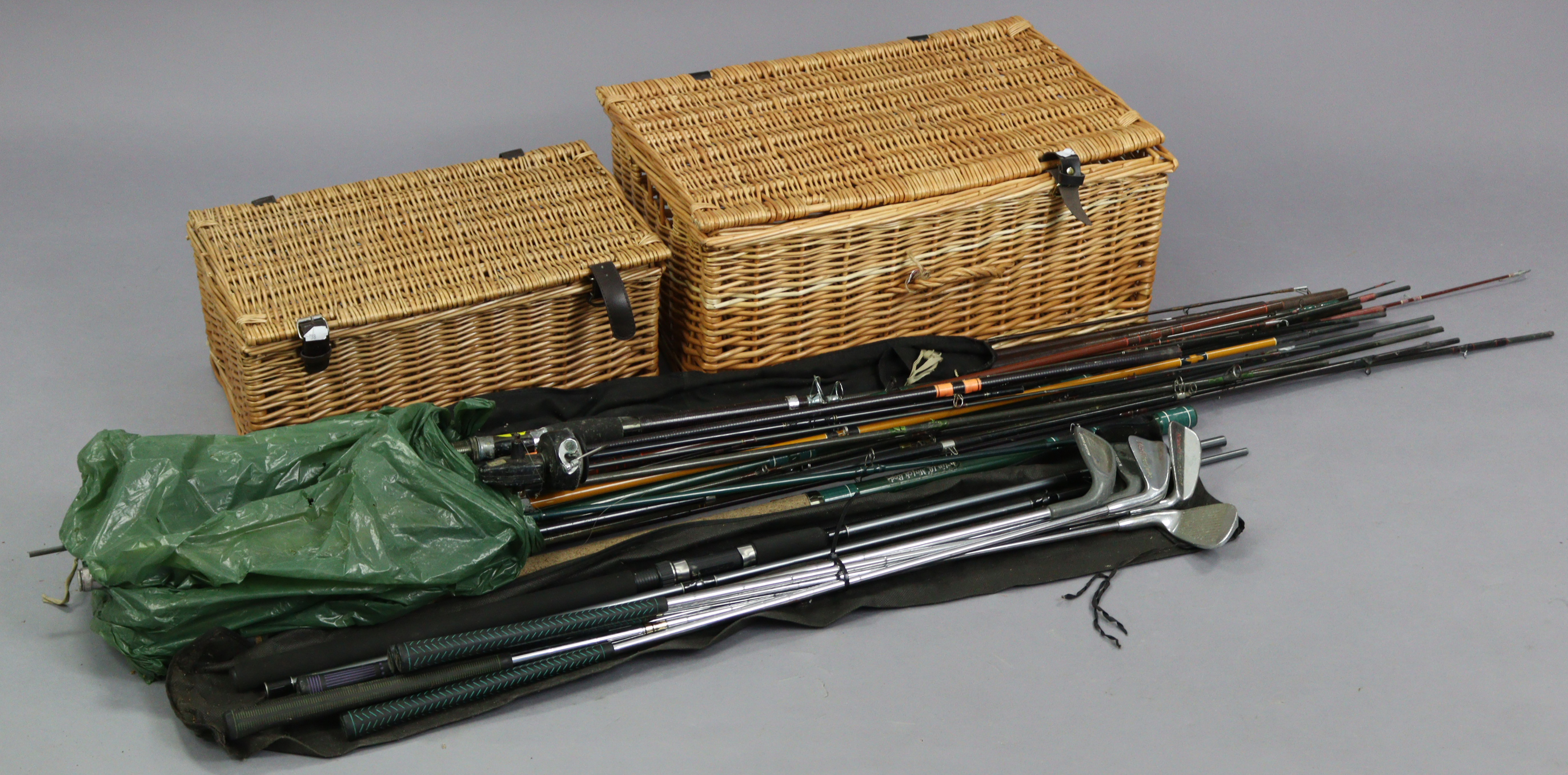 Six steel-shafted golf clubs; together with various fishing rods & reels, etc.; & two wicker