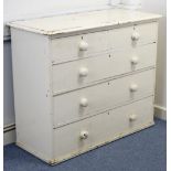 A Victorian white painted pine chest fitted two short & three long graduated drawers with turned