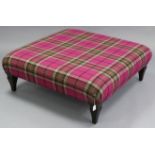 A large stool with padded square seat upholstered multi-coloured chequered material, & on short