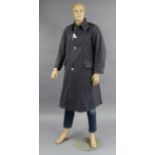 A shop’s male mannequin, 73” high; & a British military issued trench coat.