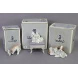 Two Lladro porcelain dog ornaments titled: “Looking Pretty” & “Little Hunter”; & a ditto ornament of