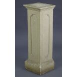 A reconstituted stone square pedestal, 11” wide x 35¼” high.