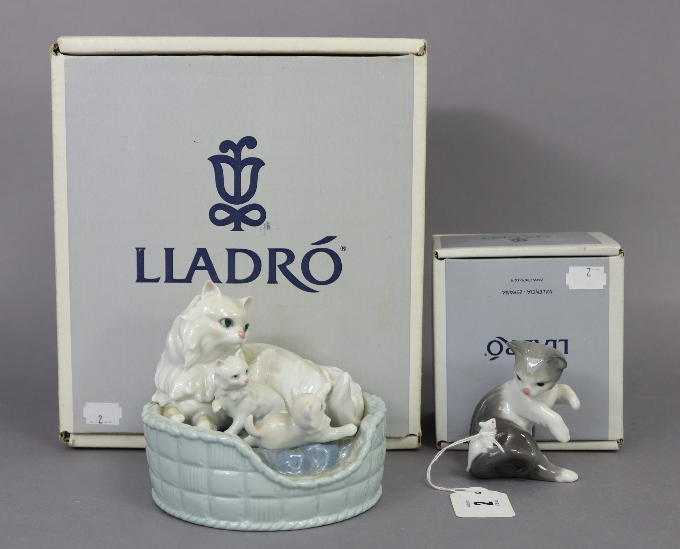 A Lladro porcelain ornament of a cat & two kittens titled: “Kitty Care”; & a ditto ornament