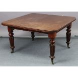 A Victorian mahogany extending dining table, with moulded edge & rounded corners to the