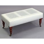 A Victorian-style stool, the padded rectangular seat upholstered pale blue geometric material, &