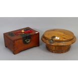 A Korean wooden tea caddy of circular form, 12” diam; & two ditto rectangular trinket boxes,
