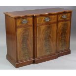 A 19th century-style inlaid-mahogany break-front side cabinet fitted three frieze drawers above