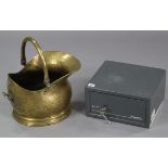A Sentry cast-metal safe, 12” x 11” x 6½” (with two keys); together with a brass coal scuttle; &