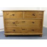 A Victorian-style large pine chest fitted two short & two long drawers with cast-metal cup