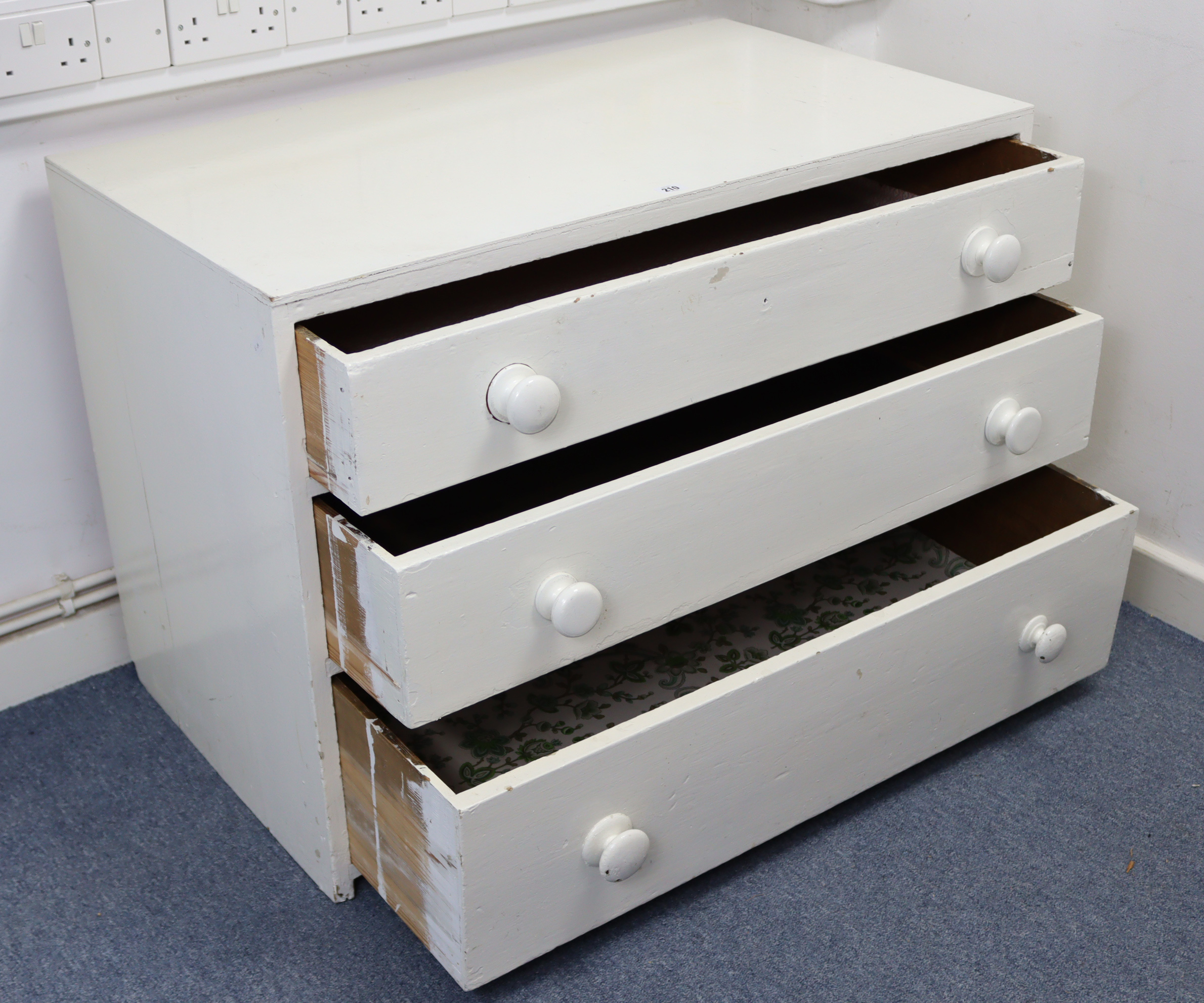 A white painted pine low chest, fitted three long graduated drawers with turned knob handles, 39” - Image 2 of 2