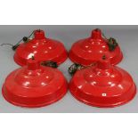 A set of four Industrial-style red enamelled ceiling light fittings, 24½” diameter x 12” high.